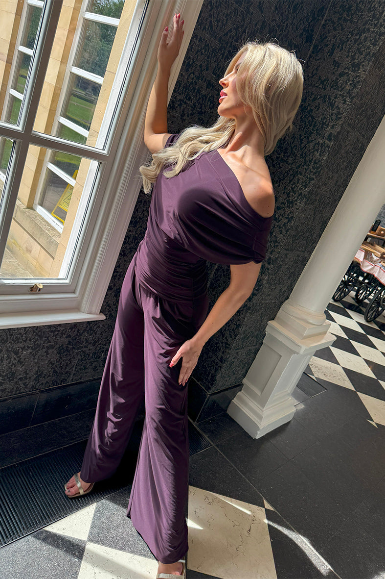 Atom Label Carbon Blackcurrant Jumpsuit
The ATOM LABEL Carbon jumpsuit is a timeless luxury staple that will have you looking and feeling your best for any occasion