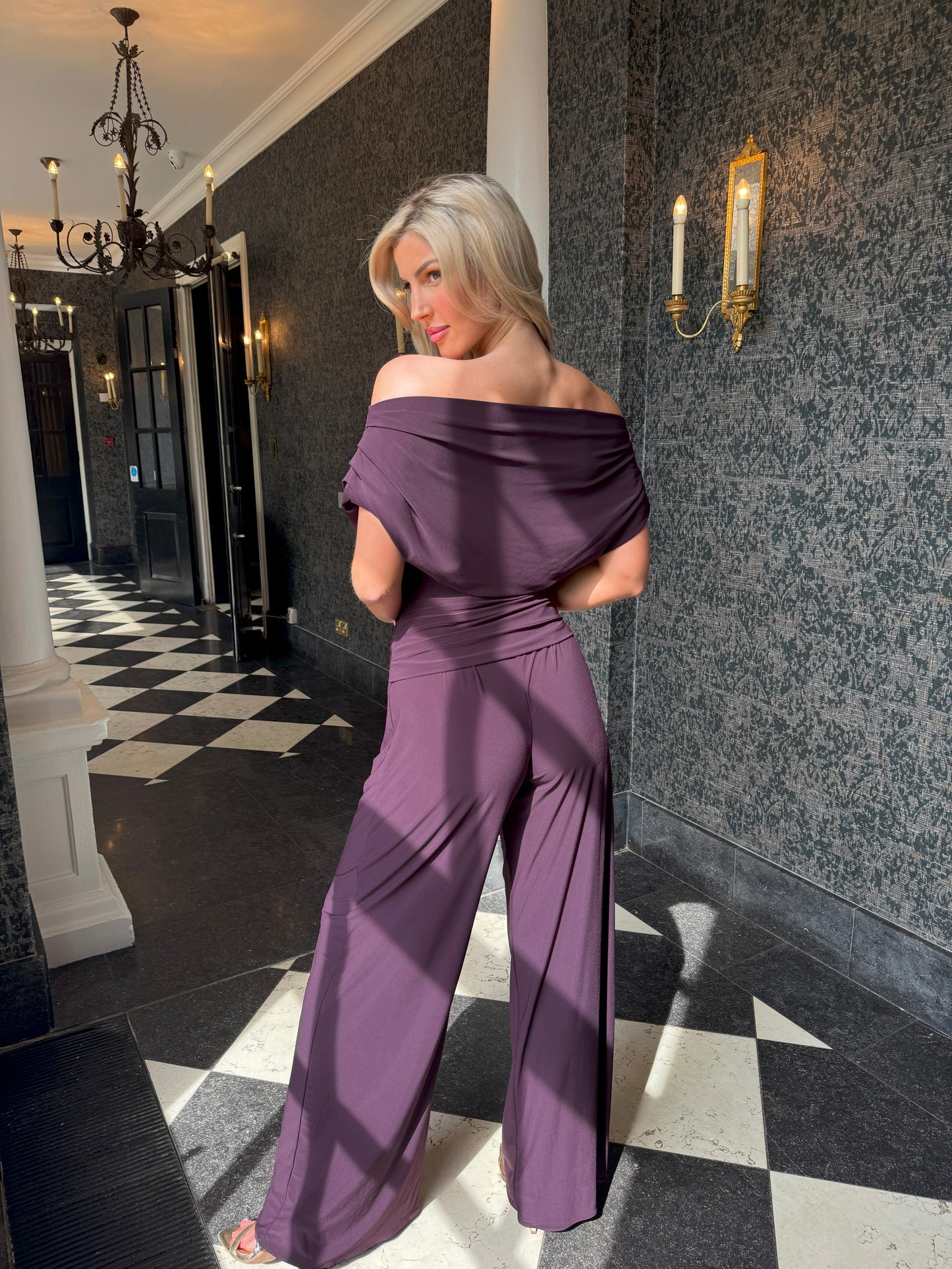 Atom Label Carbon Blackcurrant Jumpsuit
The ATOM LABEL Carbon jumpsuit is a timeless luxury staple that will have you looking and feeling your best for any occasion