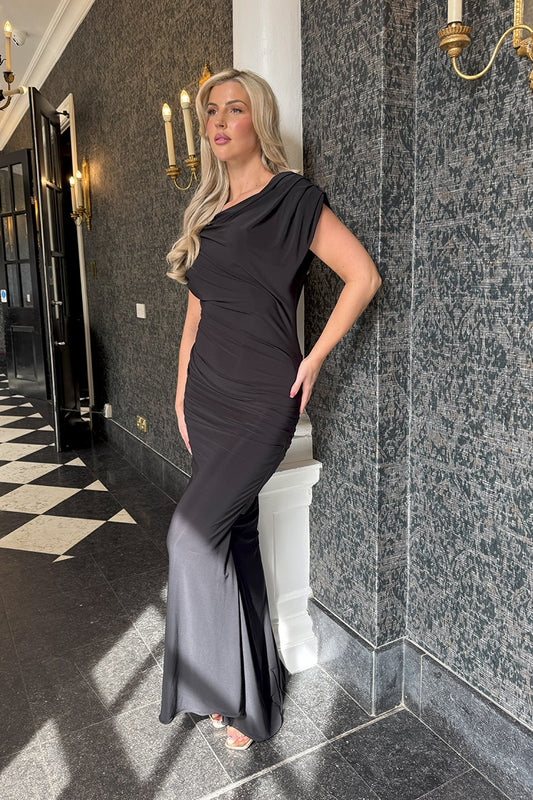 Atom Label Platinum Black Gown
The PLATINUM Jersey Gown in Black is the perfect blend of elegance and sophistication.
Cut from luxurious black jersey, this beautiful gown is crafted in England and is perfect for formal events such as black tie events or romantic date nights