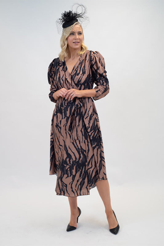 Turn heads with the&nbsp;Coco Doll Black &amp; White Pattern Dress with Tie Waist, perfect for formal events or as a standout wedding guest outfit.

Crafted from 100% polyester, this dress offers a luxurious, lightweight feel and effortless drape. The multi-tonal pink pattern creates a stunning, feminine aesthetic, while the tie waist flatters your silhouette with customisable comfort.